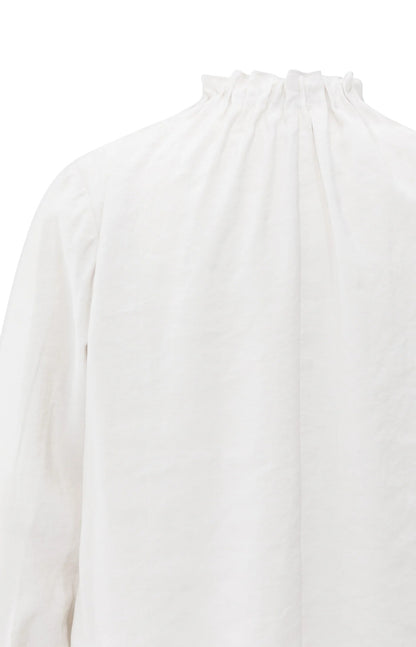 Haut à col montant avec ourlet à cordon de serrage