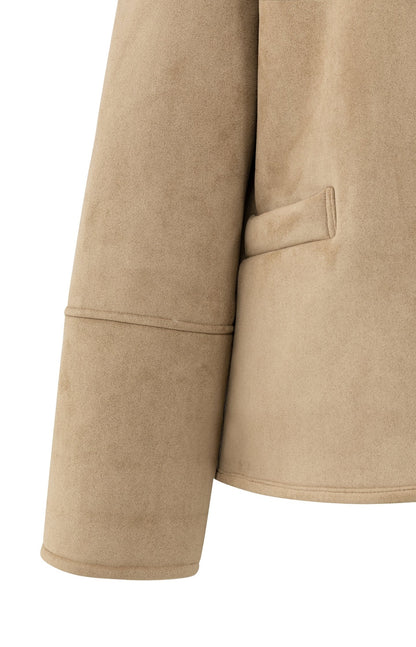 Manteau oversize en mouton retourné avec manches raglan