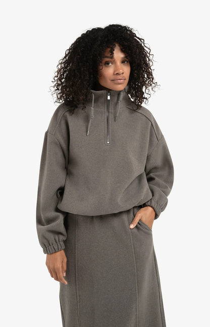 Sweat-shirt à manches ballon et col zippé